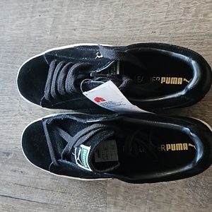 NWT. Puma Clyde,  men's shoes, size 8.5, color black